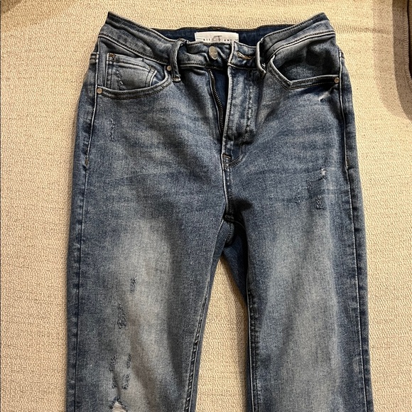 Risen Jeans Denim - High-Rise Flare Jeans in Washed Blue